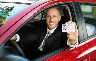 Man showing his driver's license
