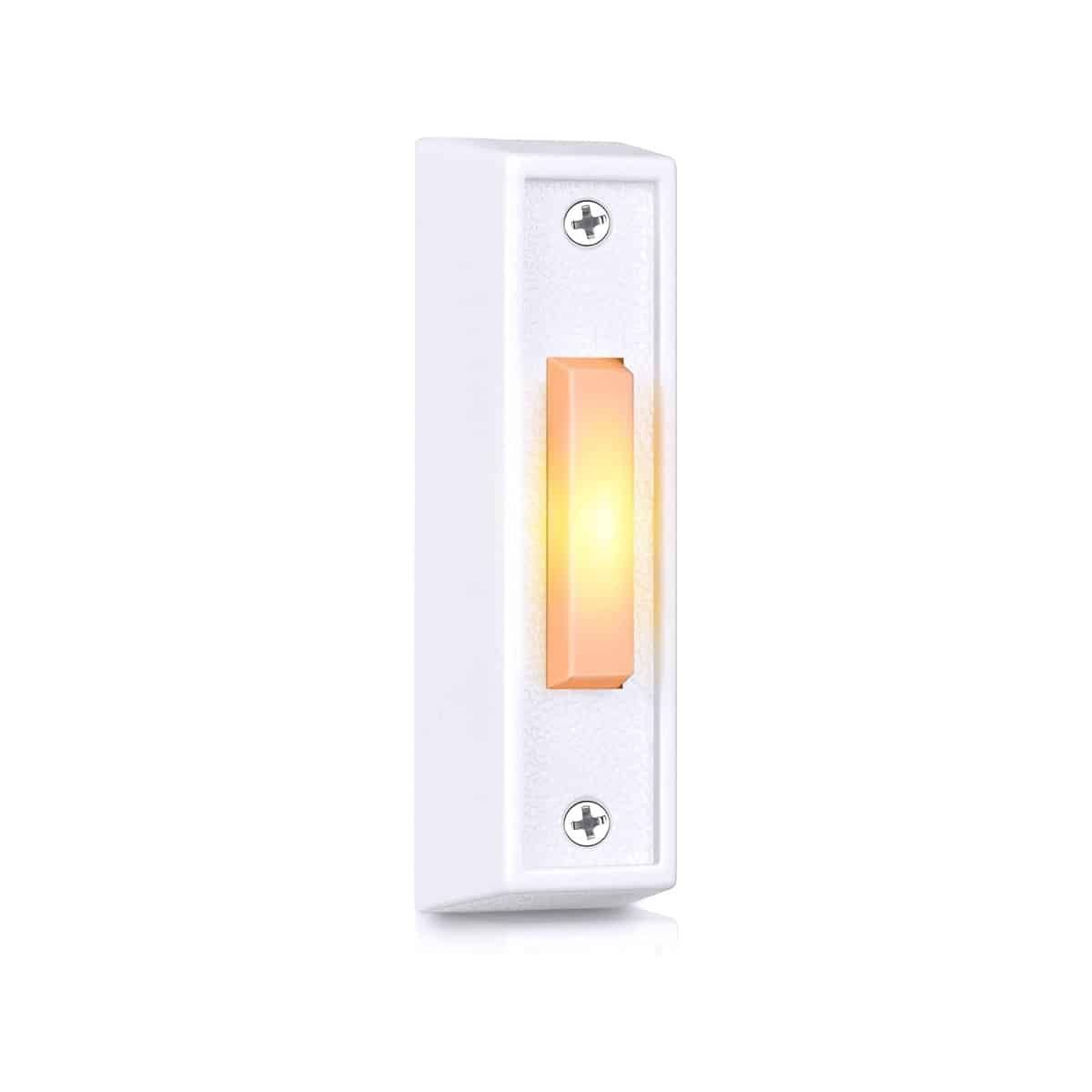 A white doorbell with an orange light on it.