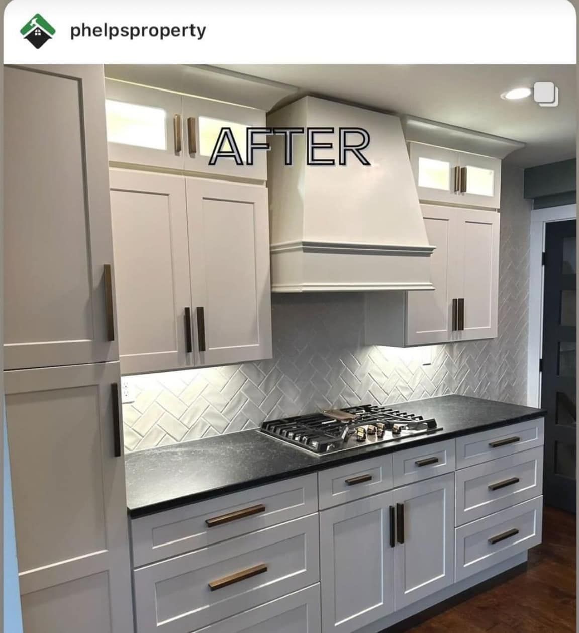 a kitchen with white cabinets and a stove top oven