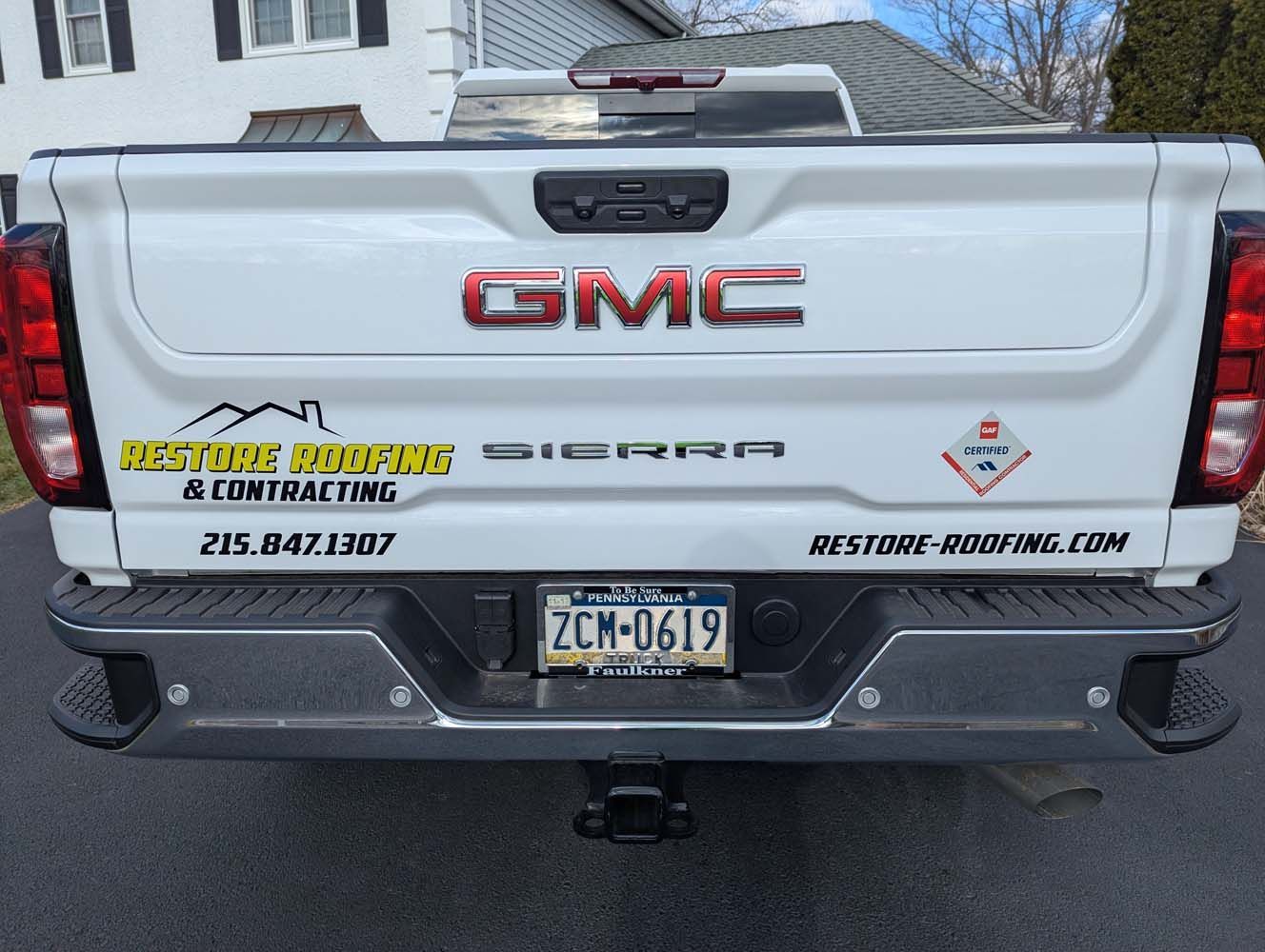 White GMC Sierra truck with 