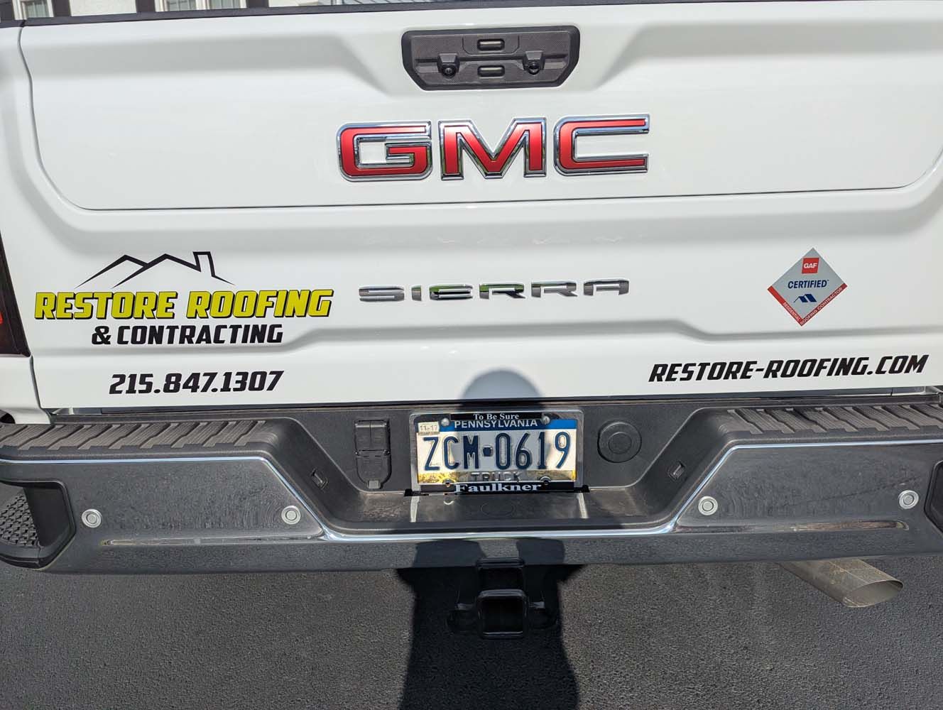White GMC Sierra truck with 