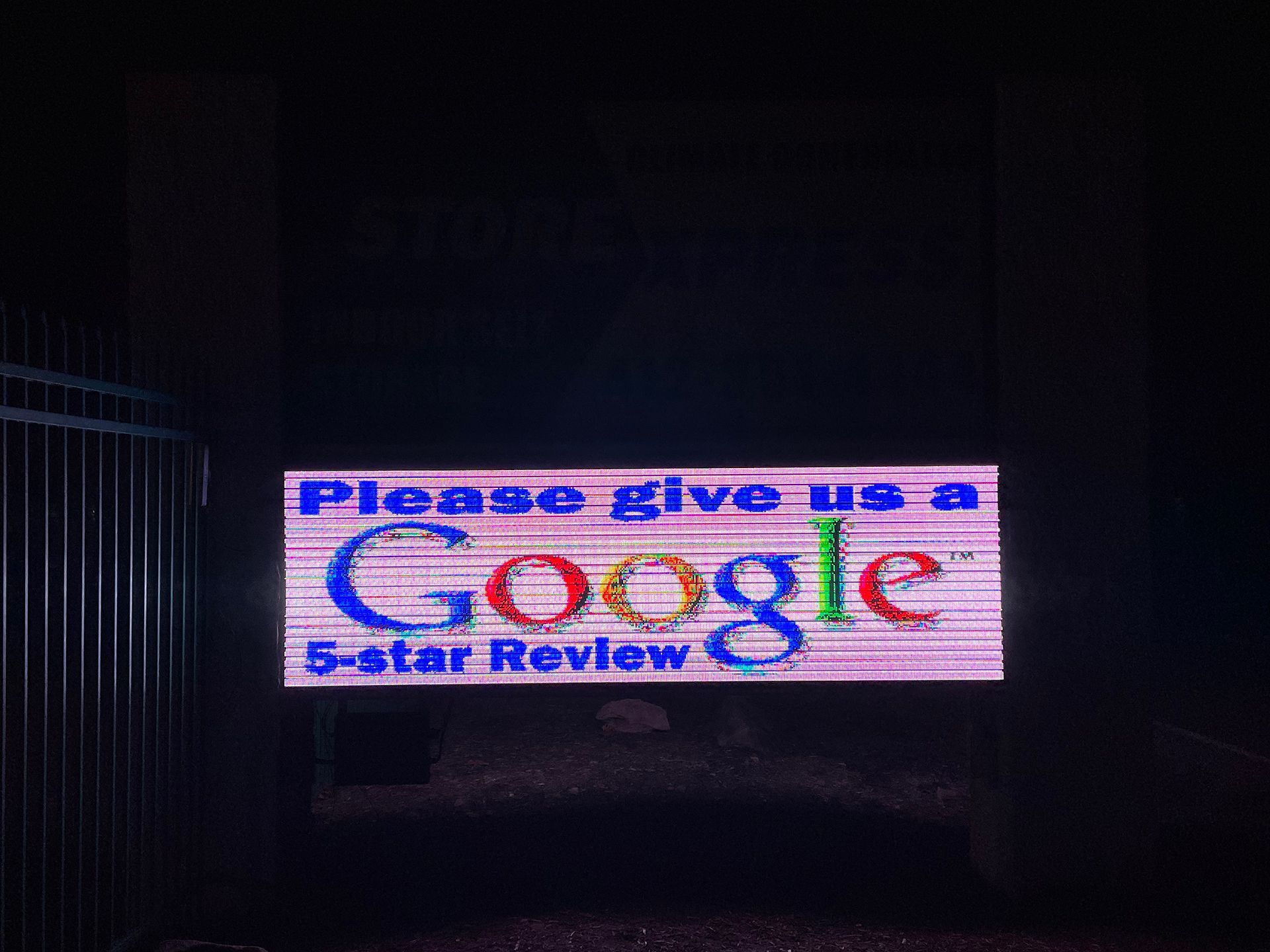 LED sign asking for Google reviews