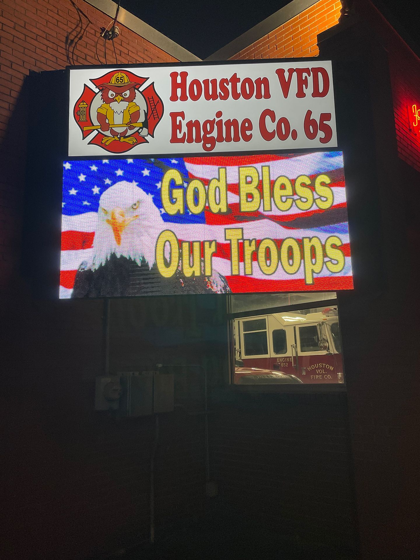 LED sign that says God Bless Our Troops