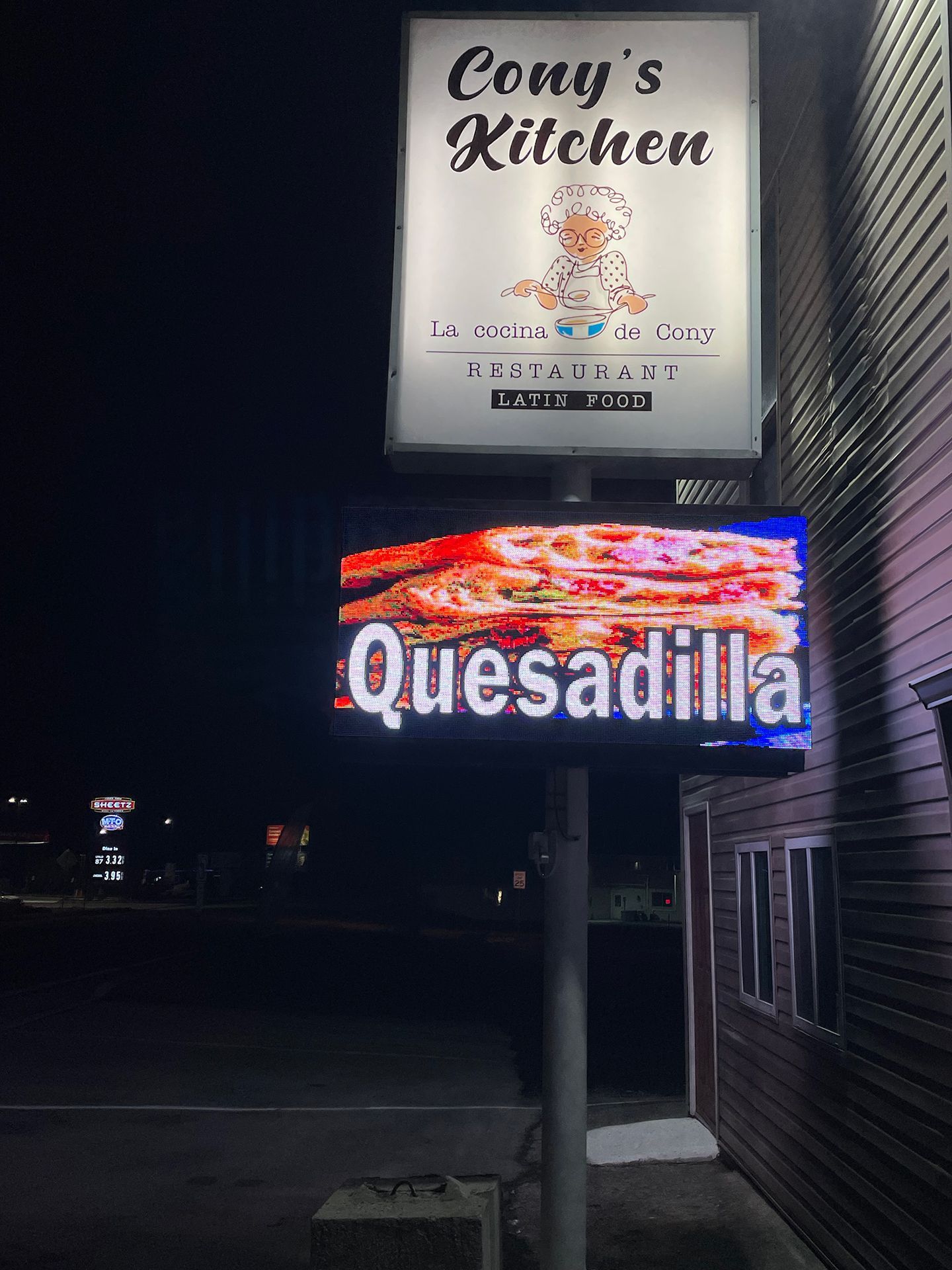 LED sign that says Quesadilla