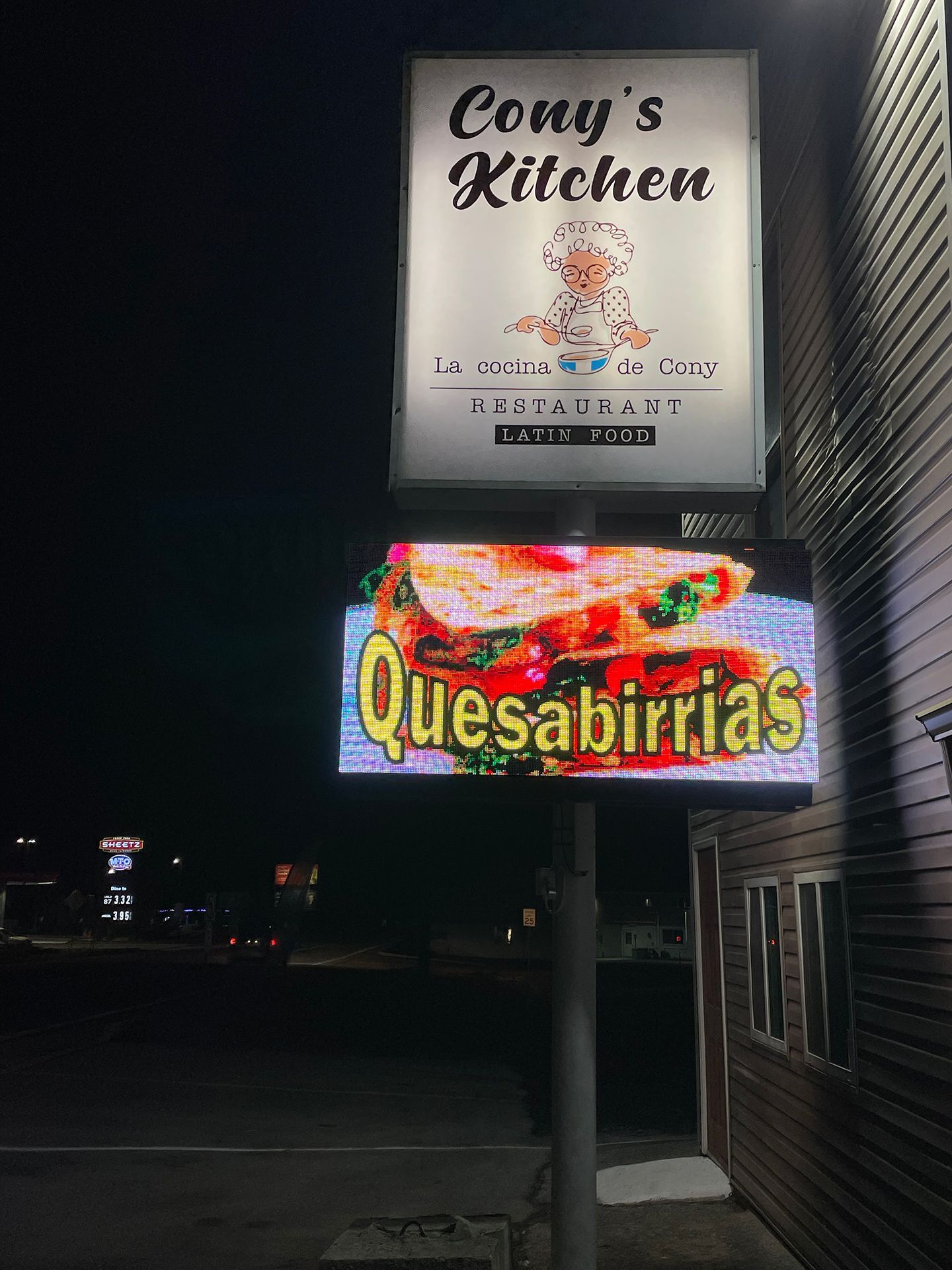LED sign that says Quesabirrias