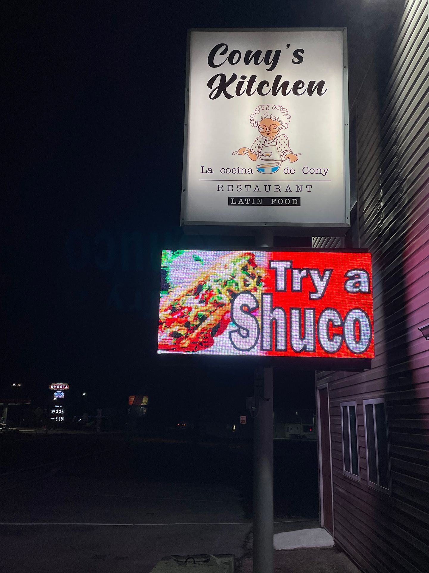 LED sign that says Try a Shuco