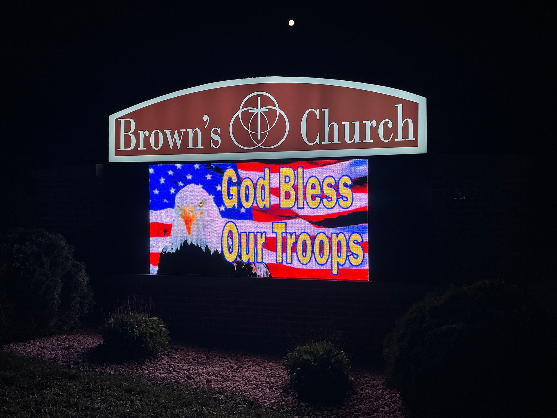 LED sign for Brown's Church that says God Bless Our Troops