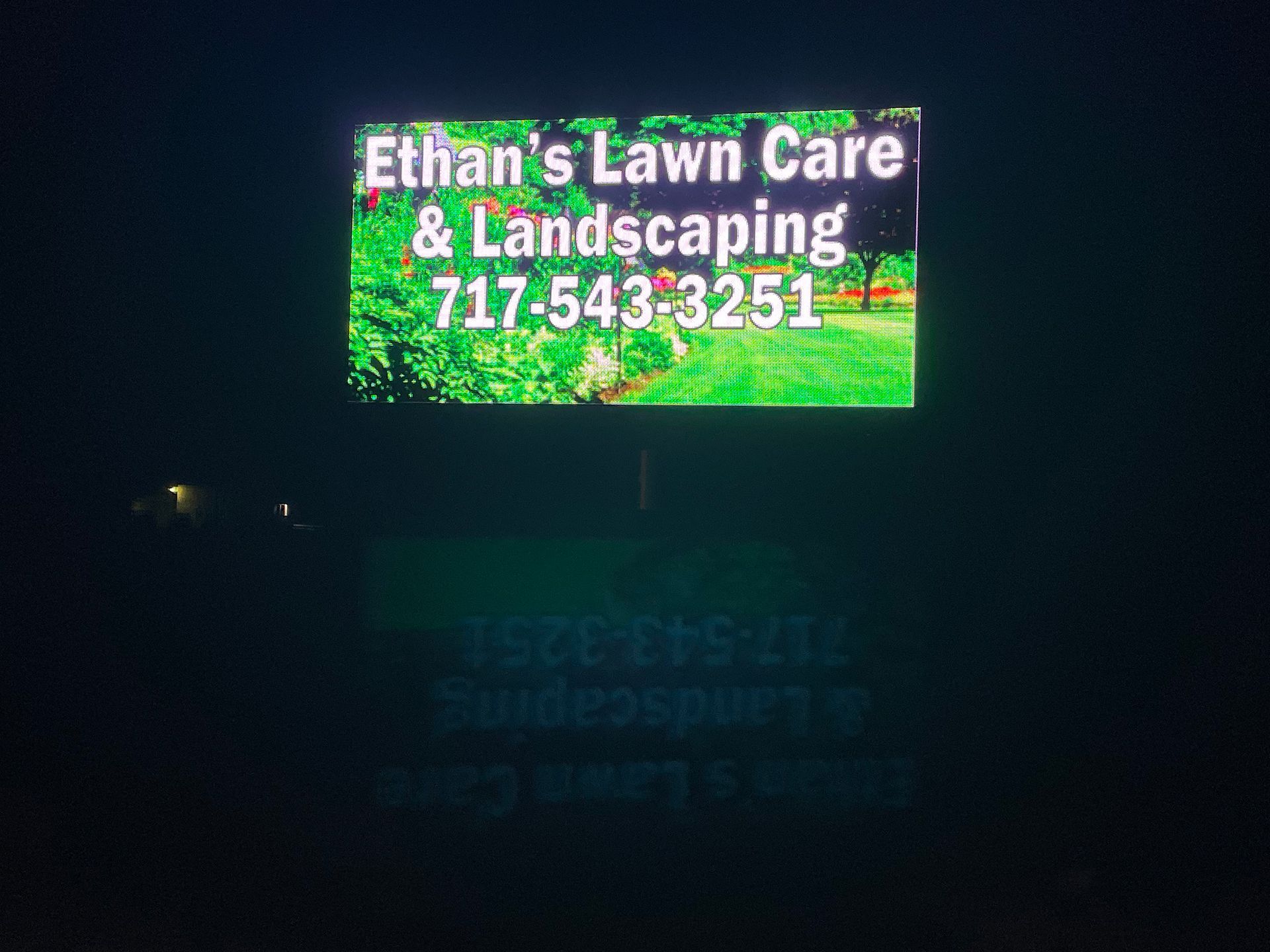 LED sign that says Ethan's Lawn Care & Landscaping