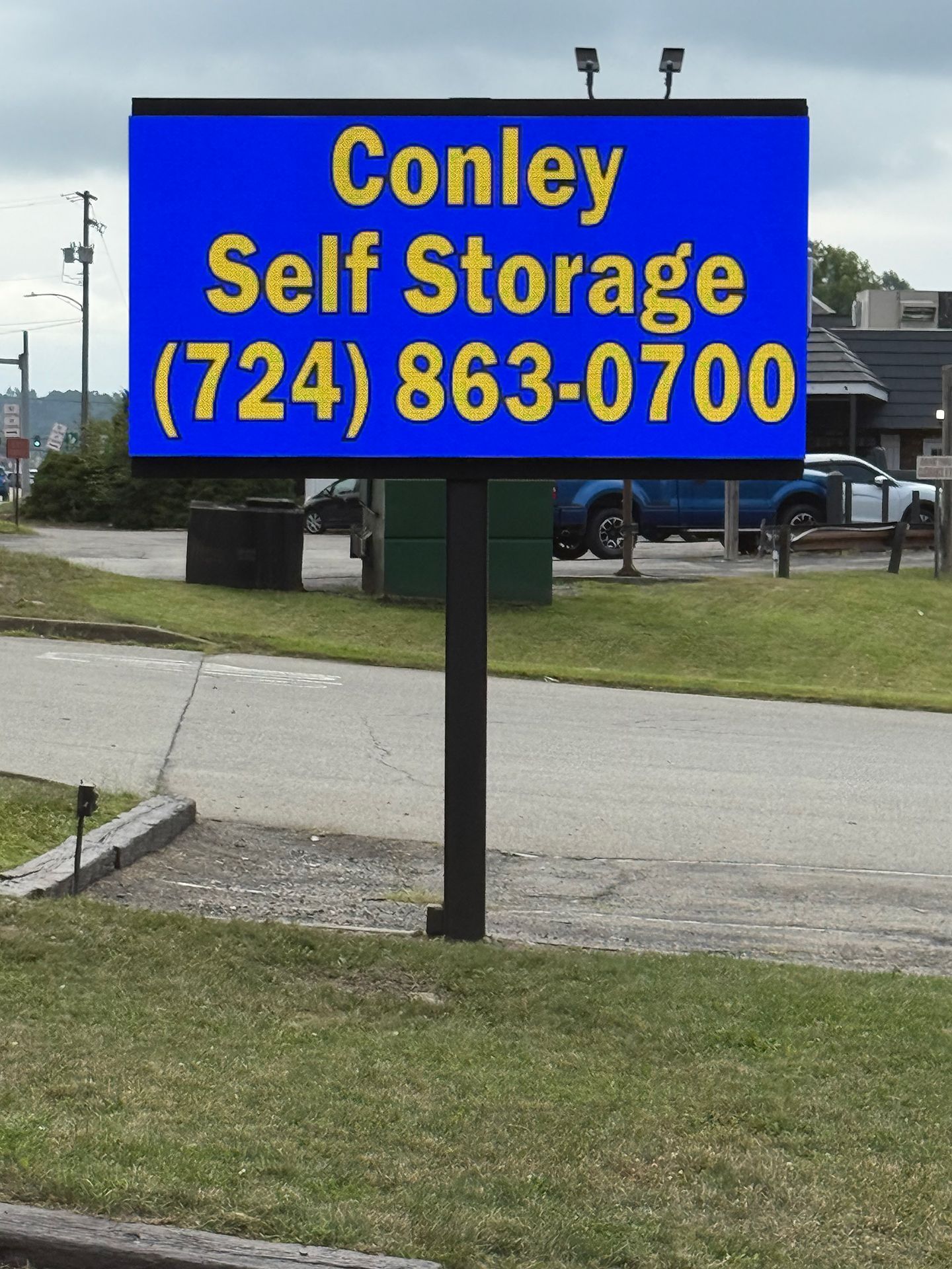 Street LED sign that says Conley Self Storage