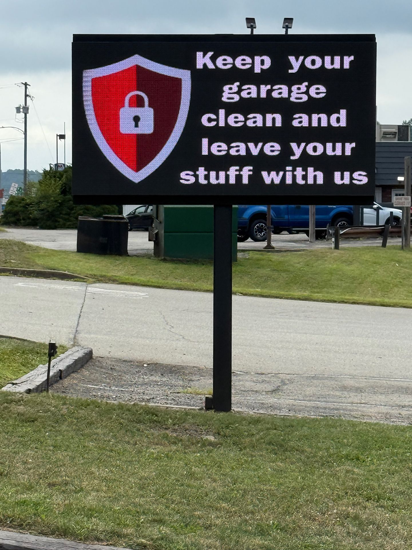 Street LED sign that says Keep your garage clean and leave your stuff with us