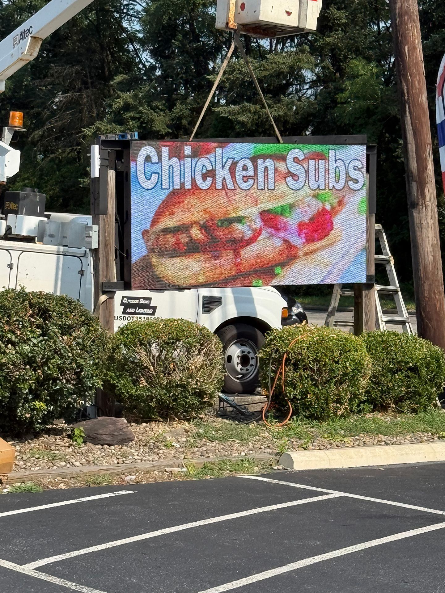 LED sign that says Chicken Subs