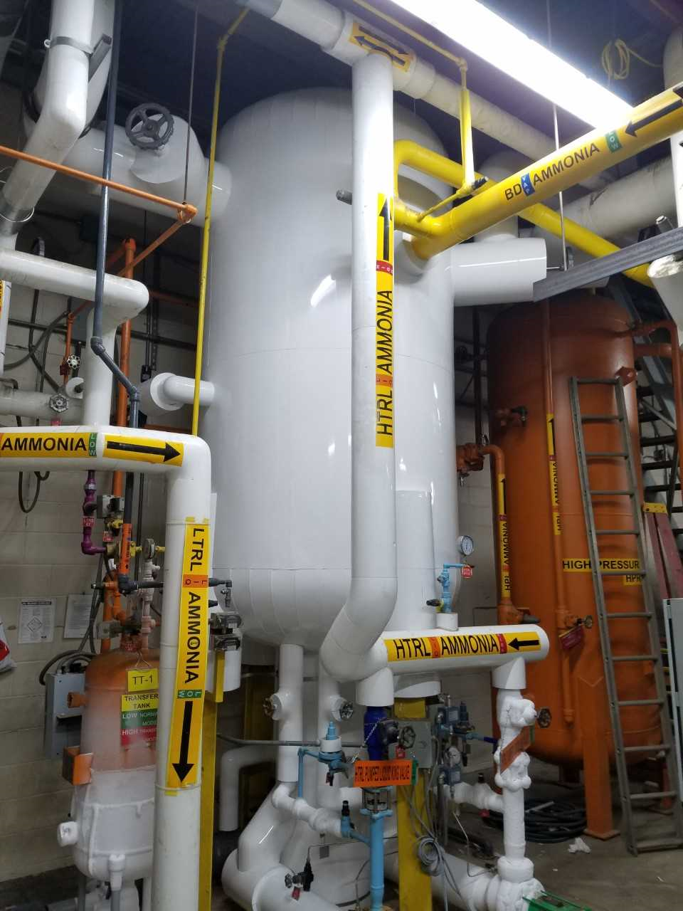 man fixing pipes