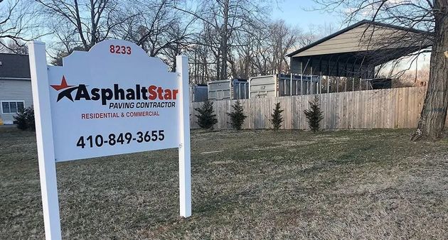 Logo for AsphaltStar Concrete Services featuring an orange star, company name, and the phone number 410-849-3655.