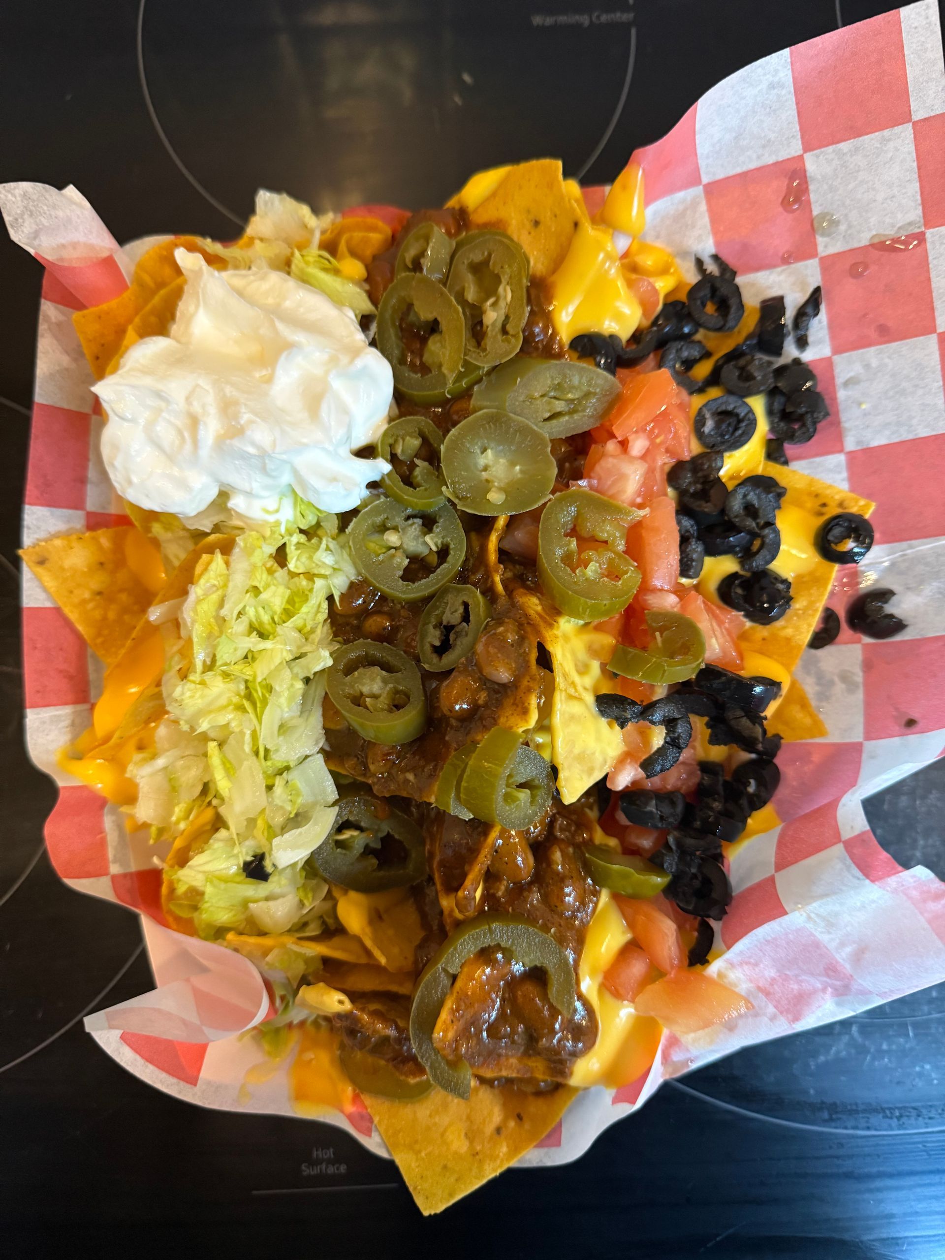 A hamburger and french fries on a white plate