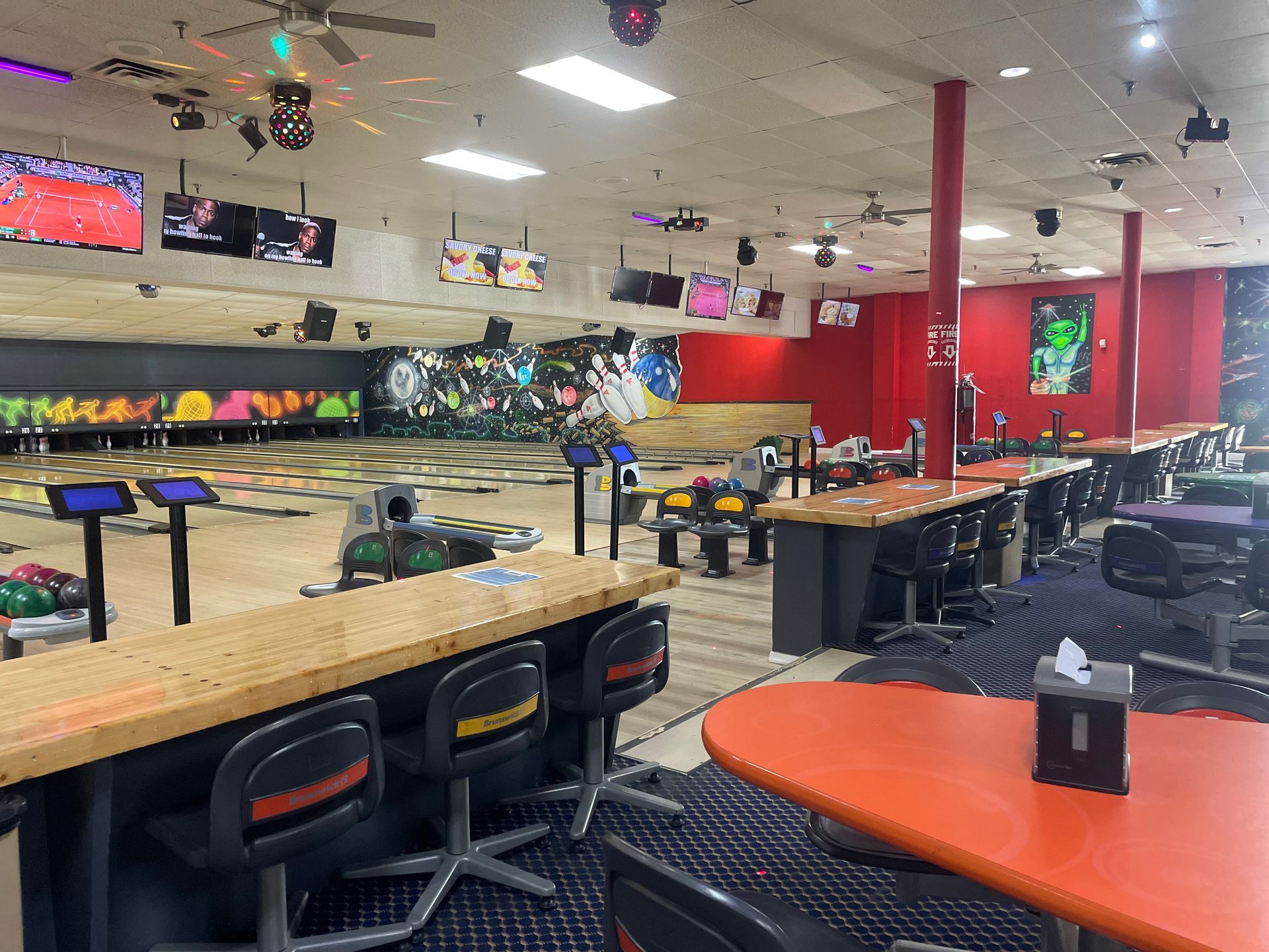 Bowling alley with tables and chairs