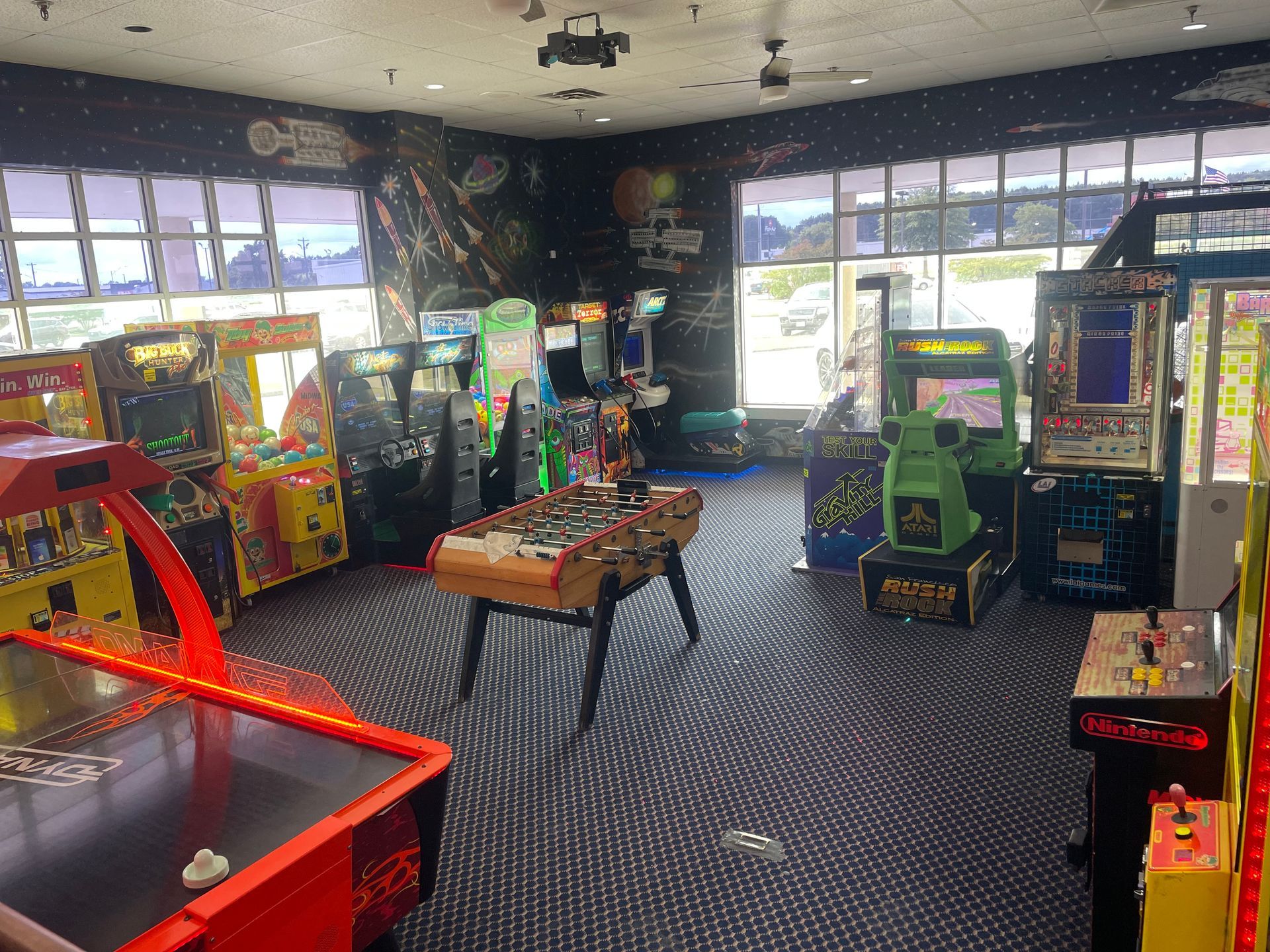 A room filled with lots of arcade games