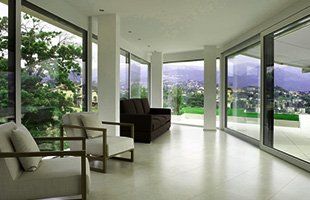 A home with glass wall and door