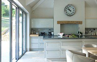 A kitchen with glass door