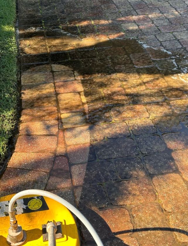 Before and after pressure washing on outdoor pavers