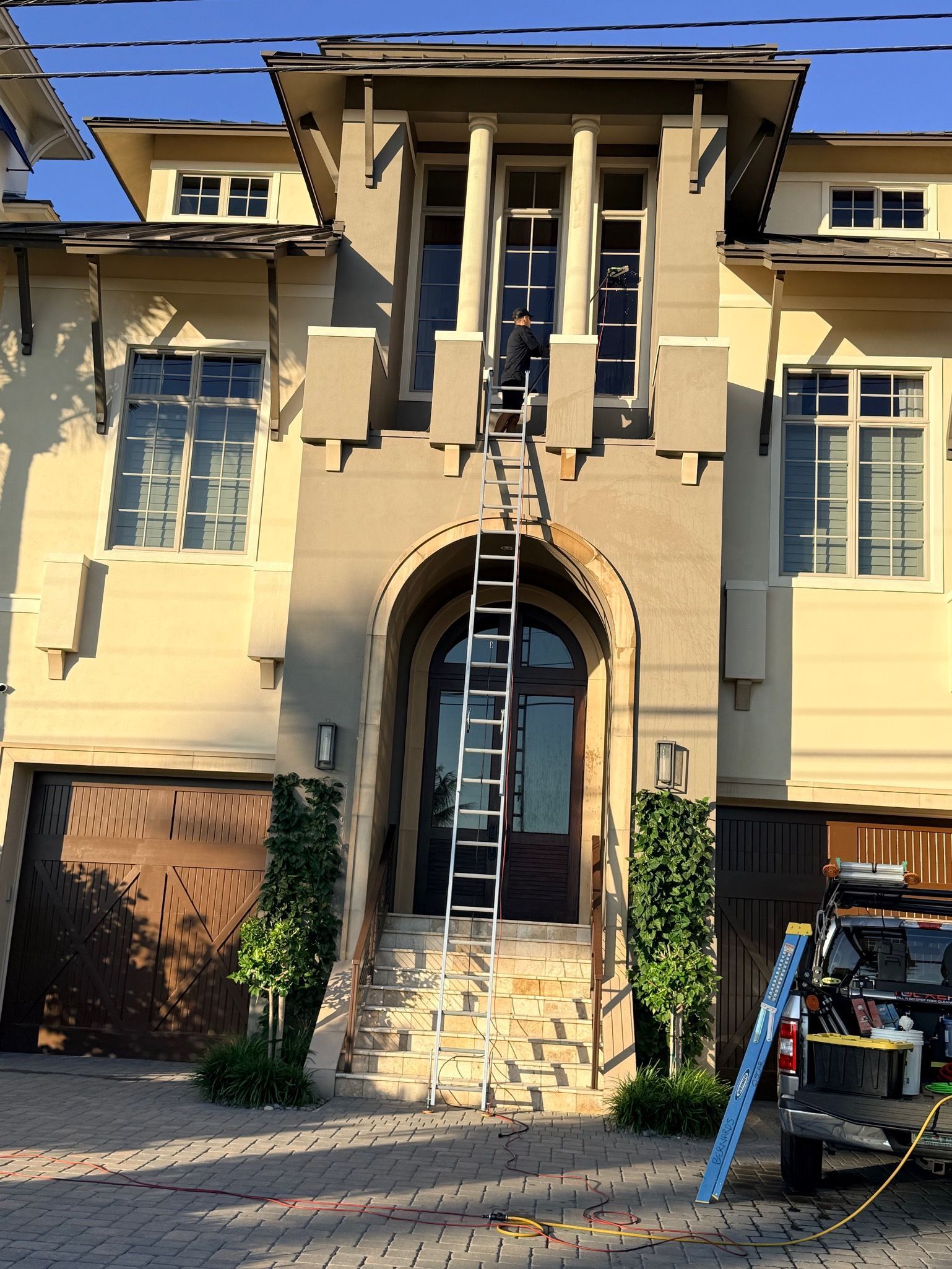 Exterior painting project on multi-story home
