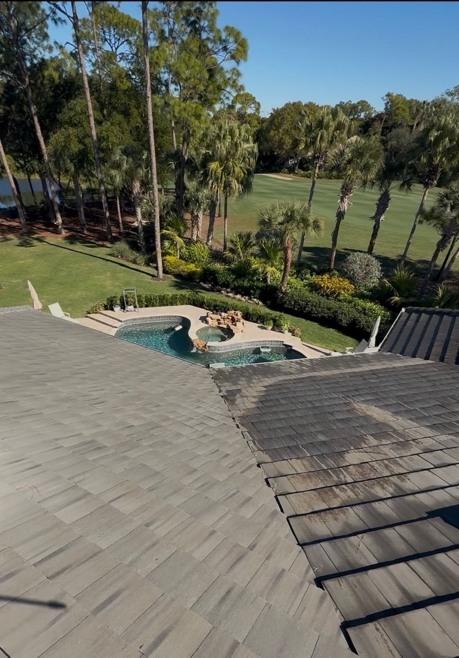 Residential property surrounded by trees and landscaping