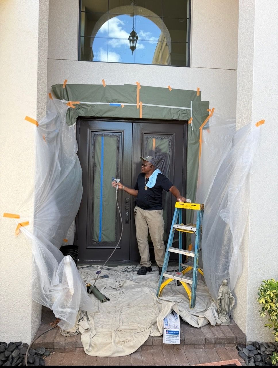 Exterior entry door prepared for professional painting