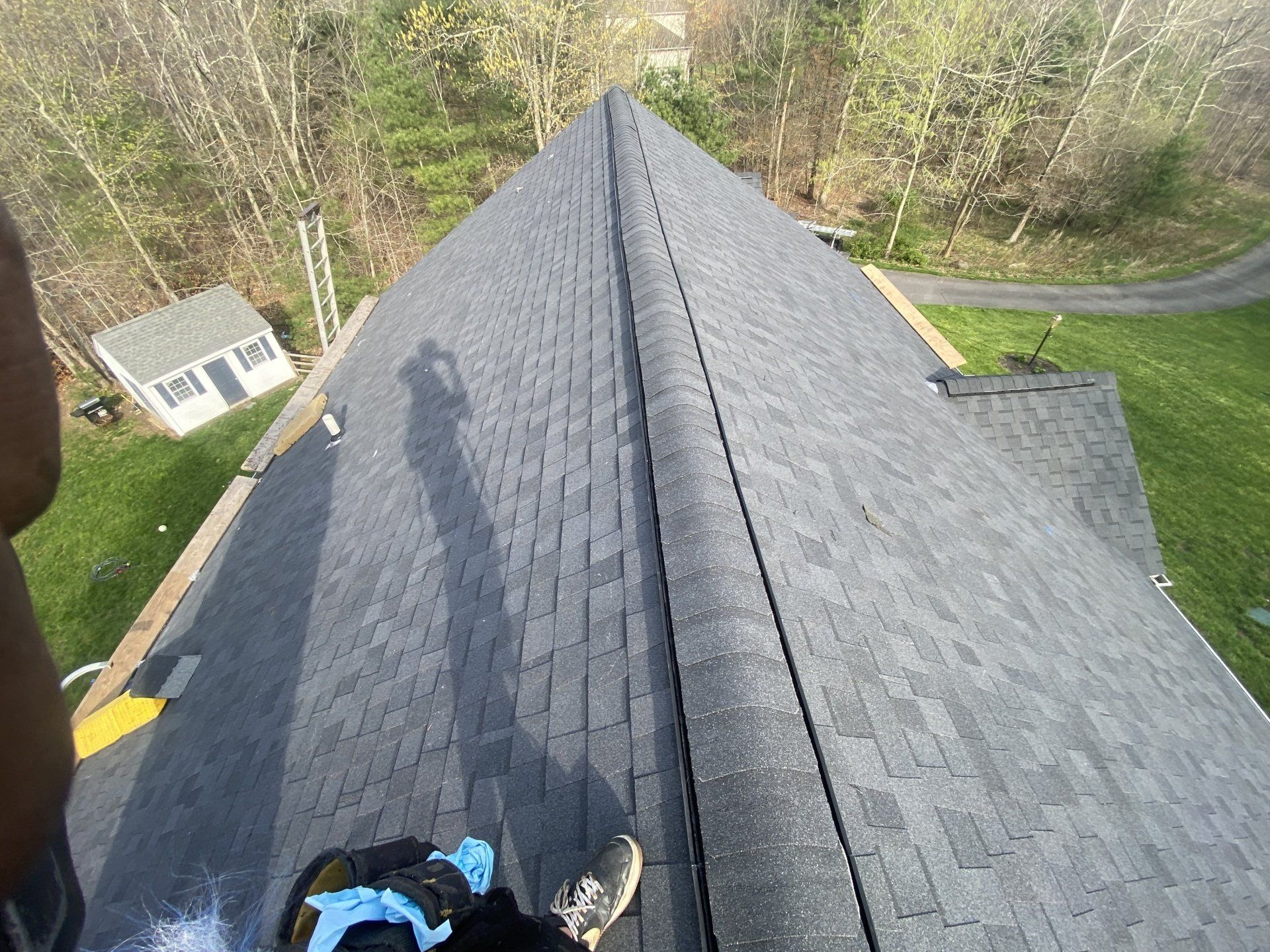 bluish gray roof showing the small white house