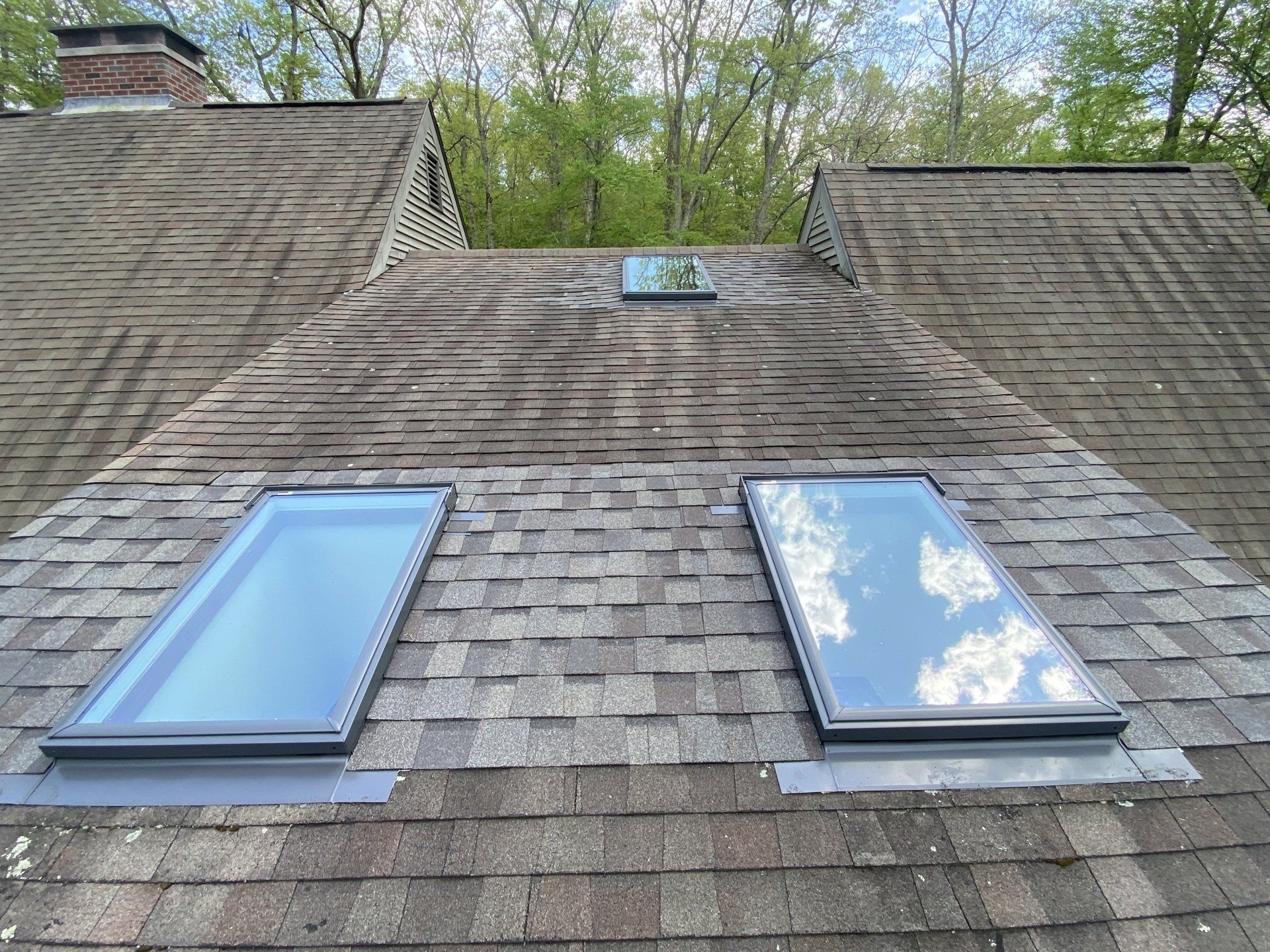 brownish roof with 2 small sunroof
