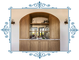A wooden cabinet with a bar inside of it.