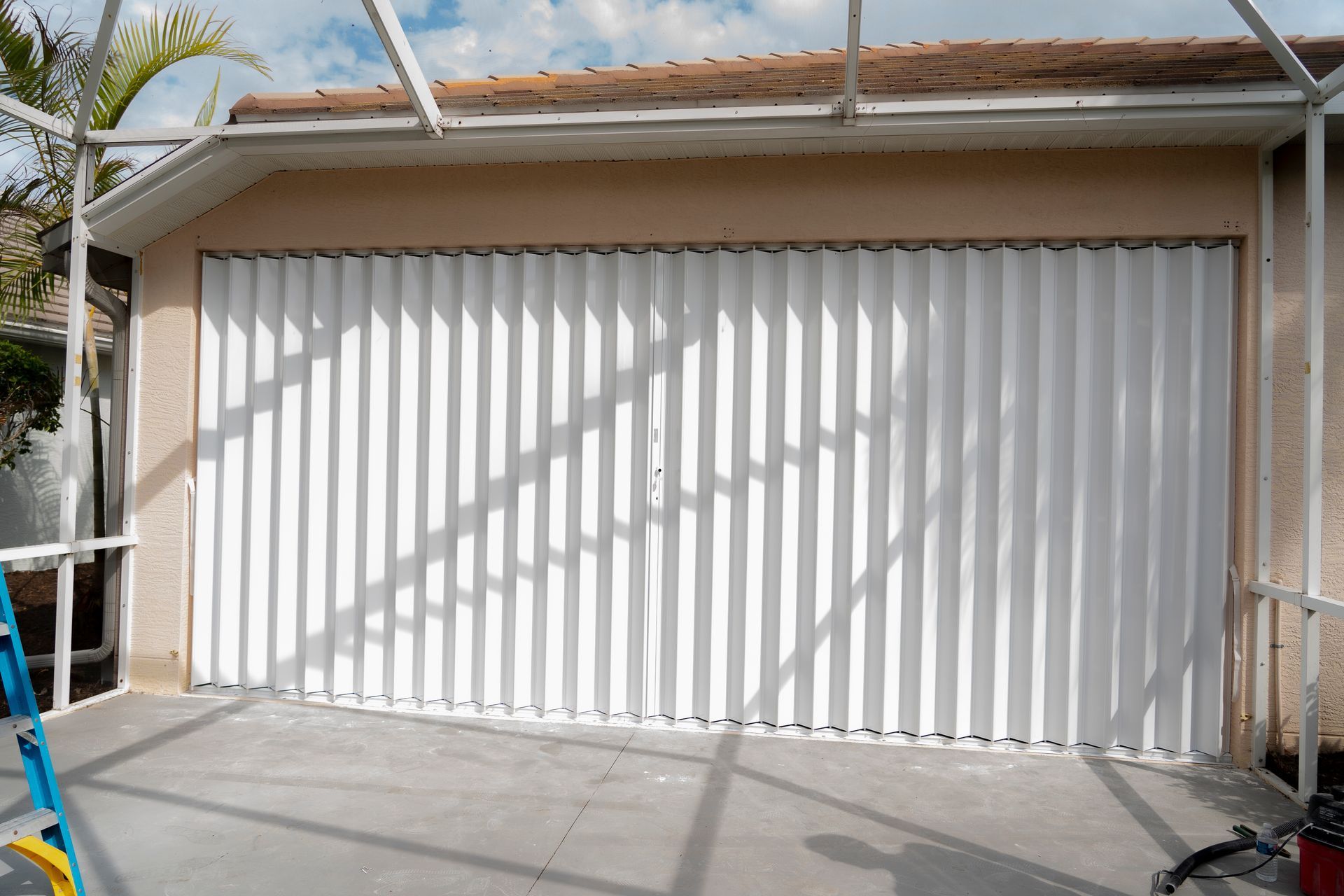 White accordion shutters