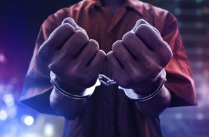 Arrested man in handcuffs