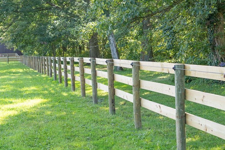 Wood fence surrounding a property