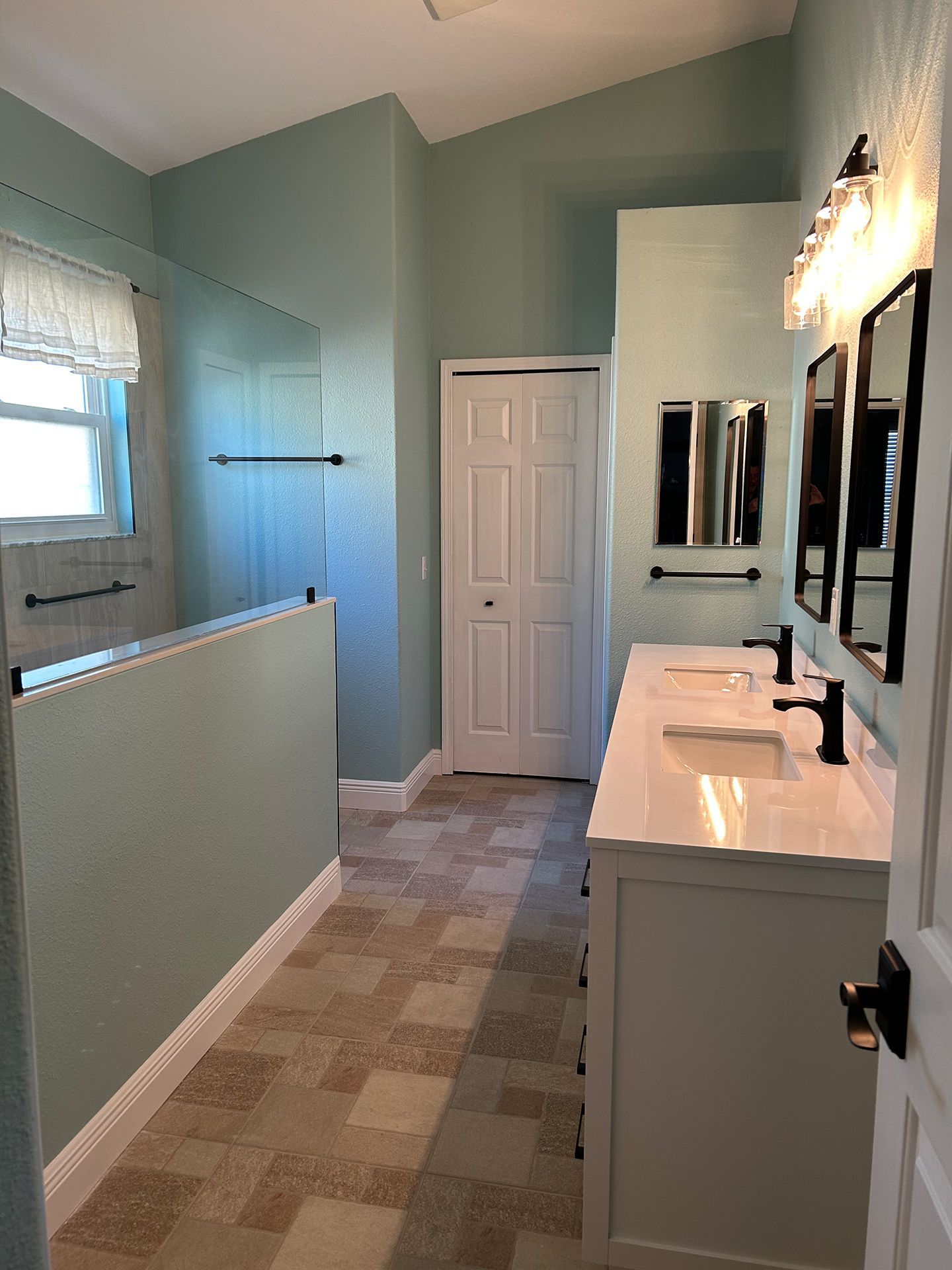 A bathroom with light blue walls