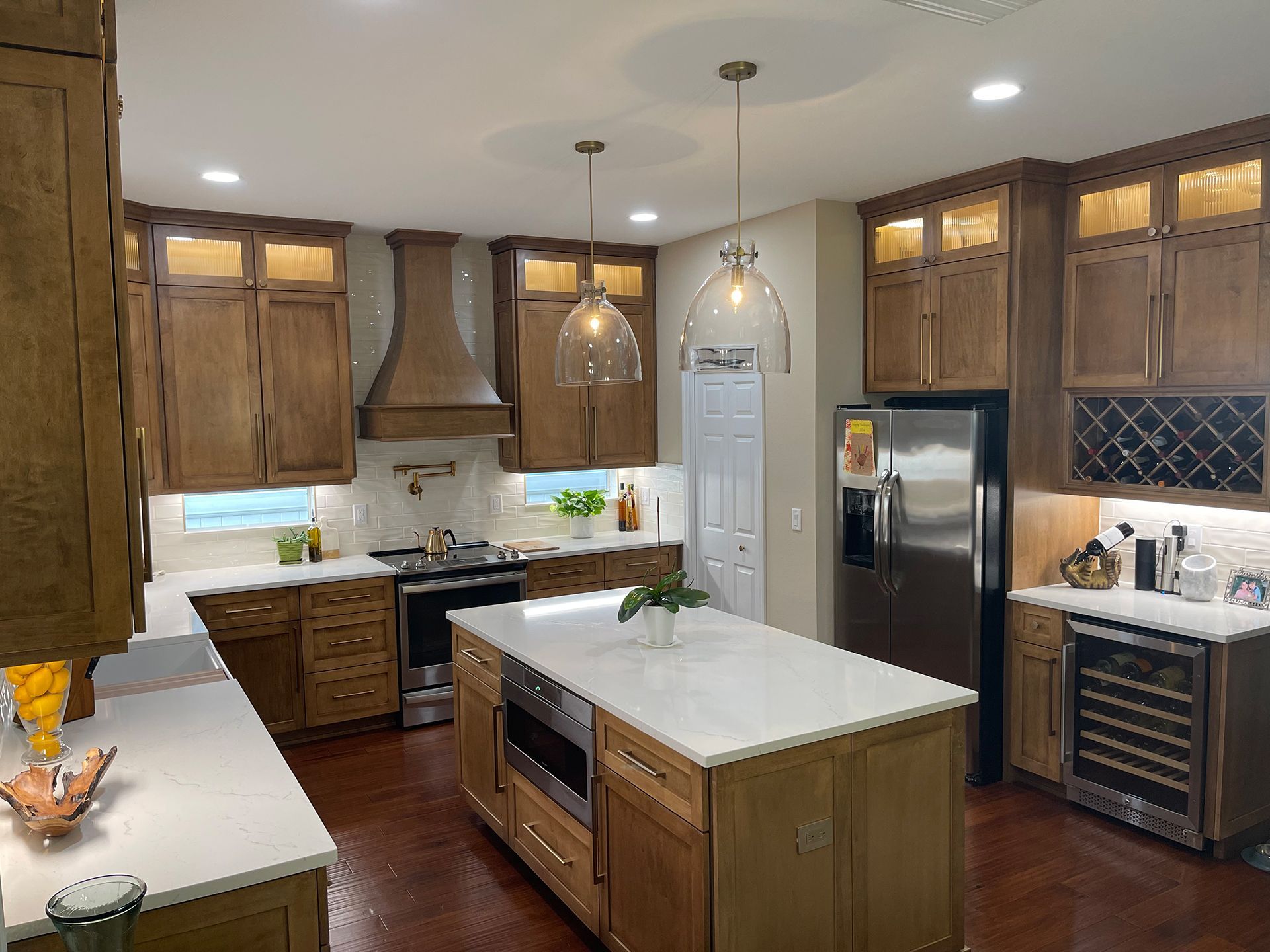 A kitchen with wooden cabinets