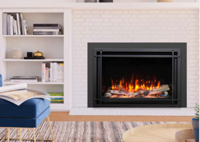Electric fireplace with flickering flames, framed in black, set in a white brick wall.