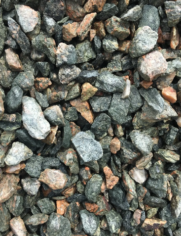 Crushed rock aggregate; gray, black, and reddish-brown colors.