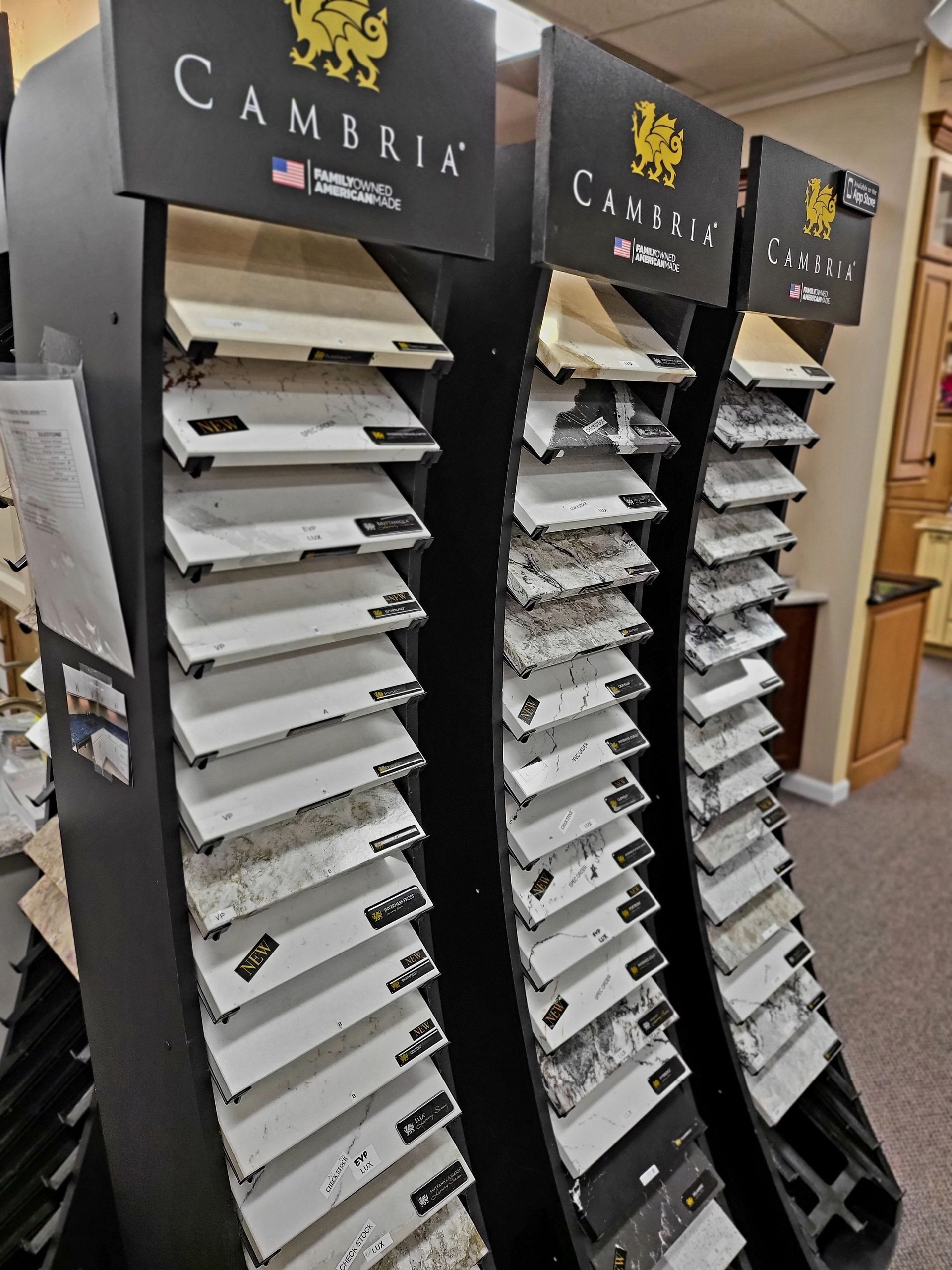 Cambria countertop display racks with sample slabs in a showroom