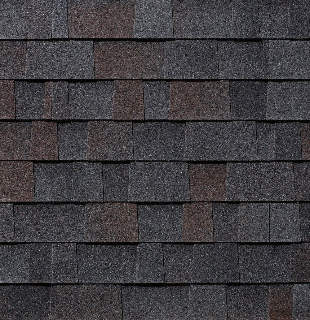 Dark gray and brown asphalt roof shingles.