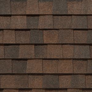 Brown asphalt roof shingles in a textured pattern.
