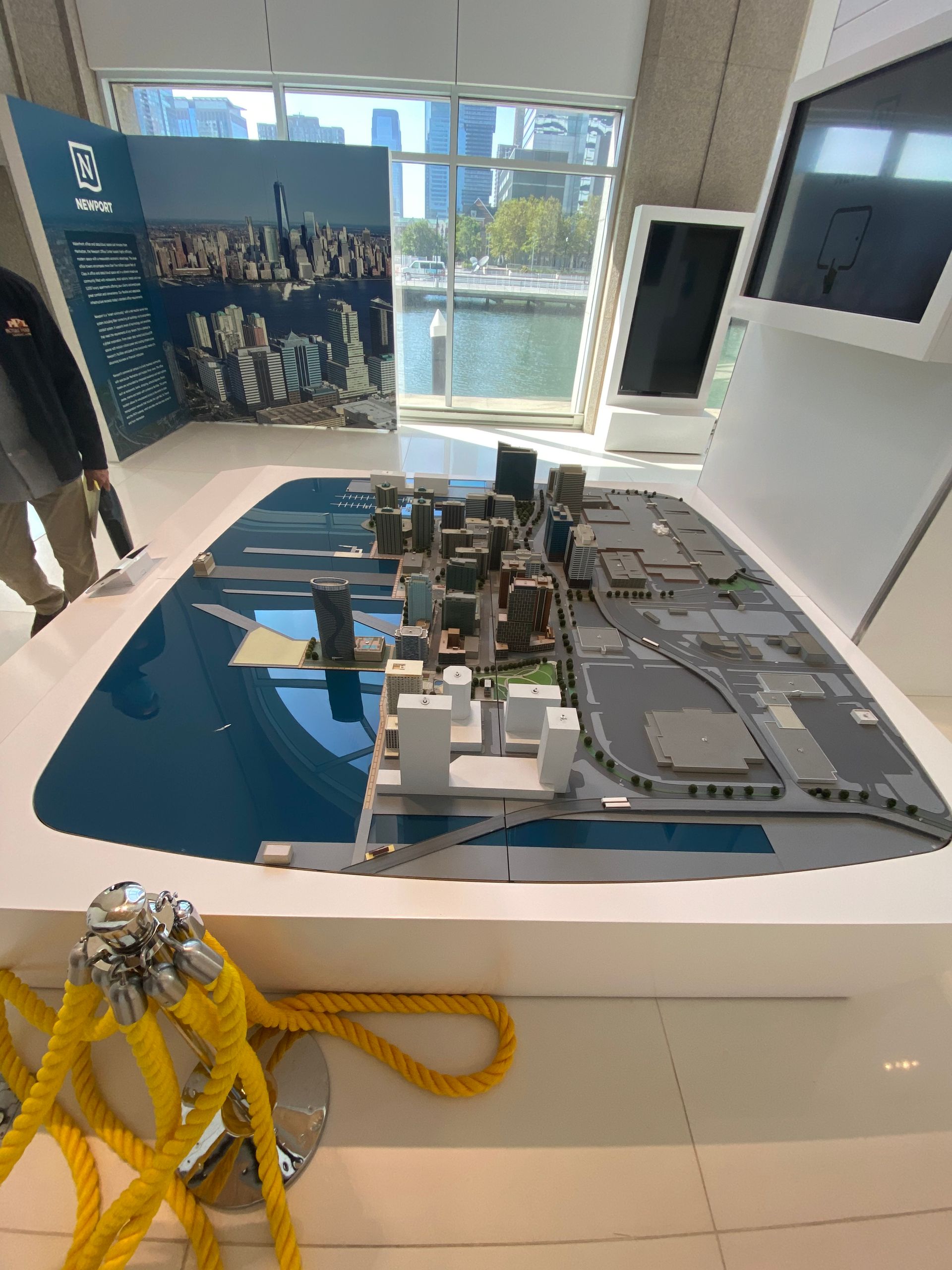 A table with a model of a city on it.