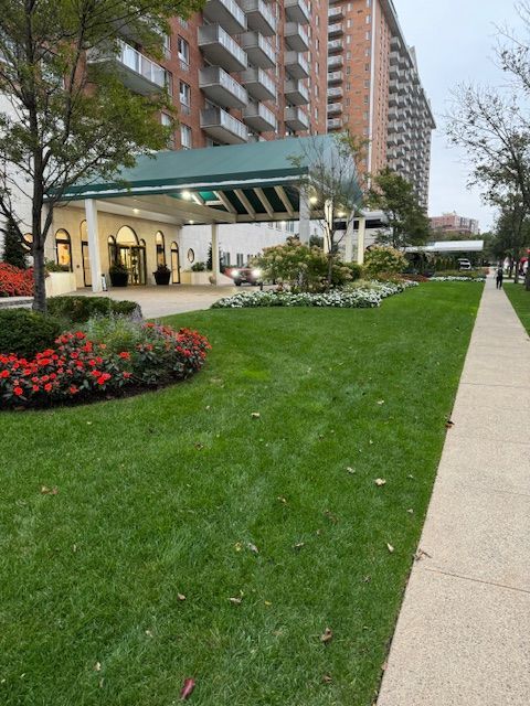 A large building with a walkway leading to it