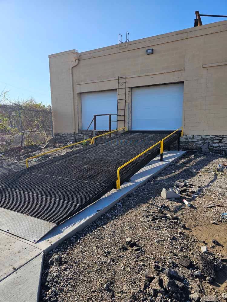 A ramp is being built in front of a building.