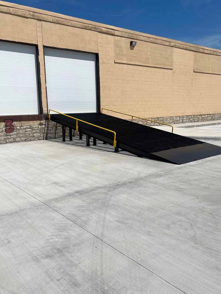 A ramp is sitting in front of a building.