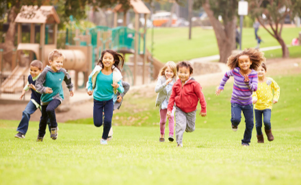 Children running in the field