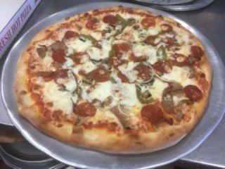 pepperoni and green pizza