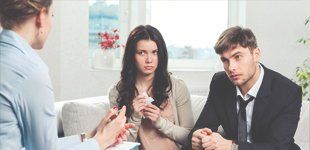 Couple consulting to lawyer