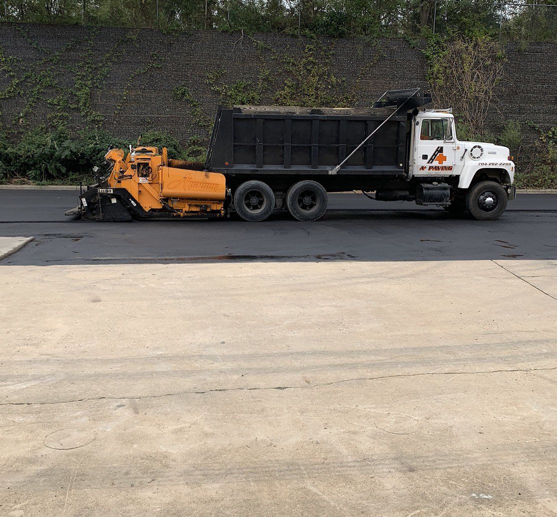 Asphalt and sealcoating services