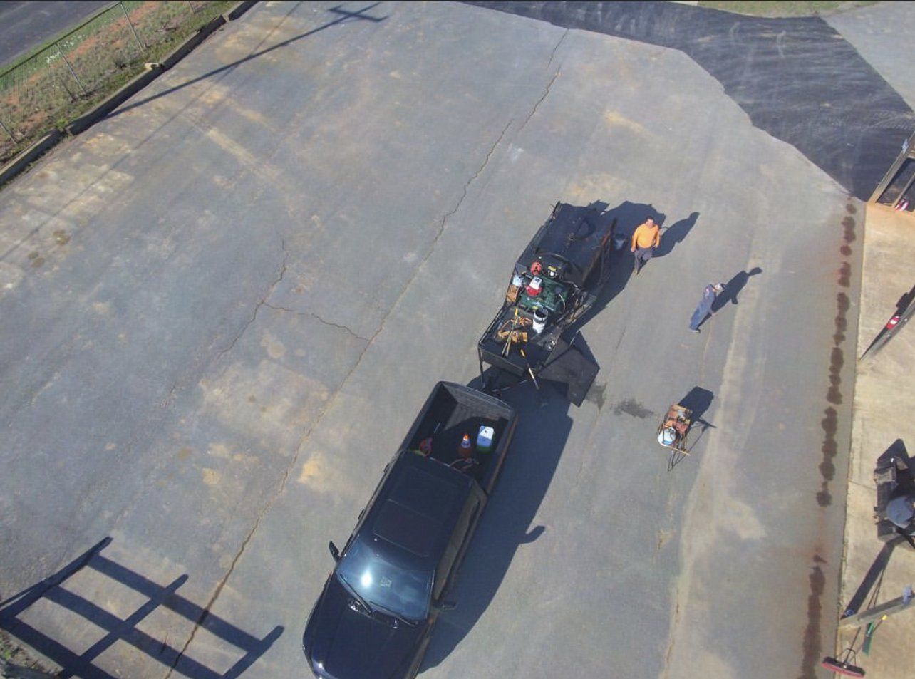 Asphalt and sealcoating services
