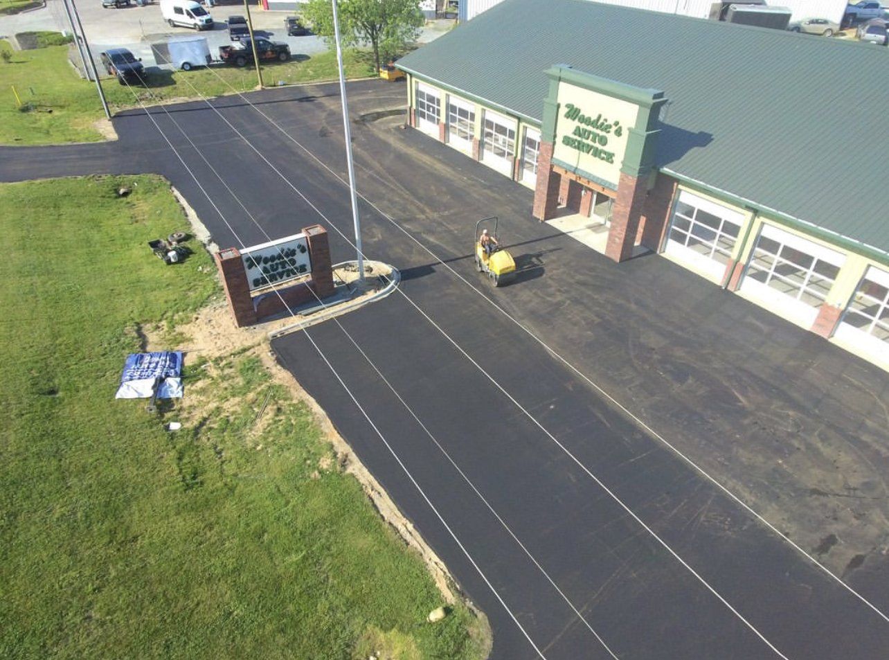 Asphalt and sealcoating services
