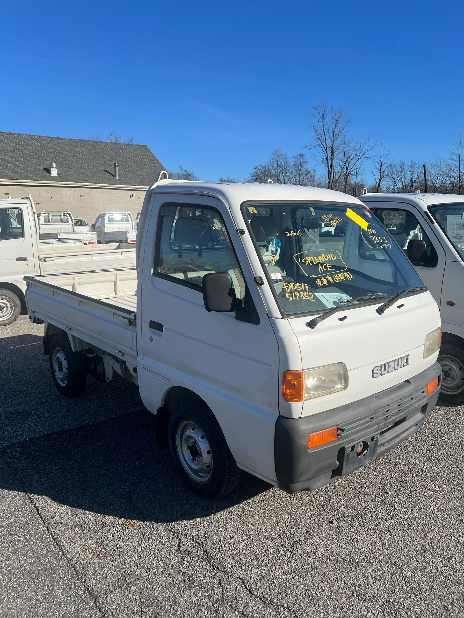 1999 Suzuki Carry Kei Truck 4WD For Sale In a Parking Lot